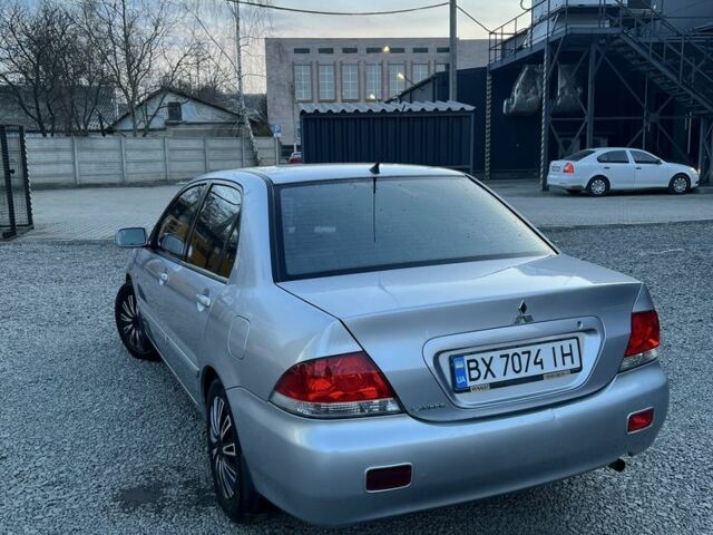 Серый Мицубиси Лансер, объемом двигателя 1.6 л и пробегом 193 тыс. км за 3350 $, фото 1 на Automoto.ua