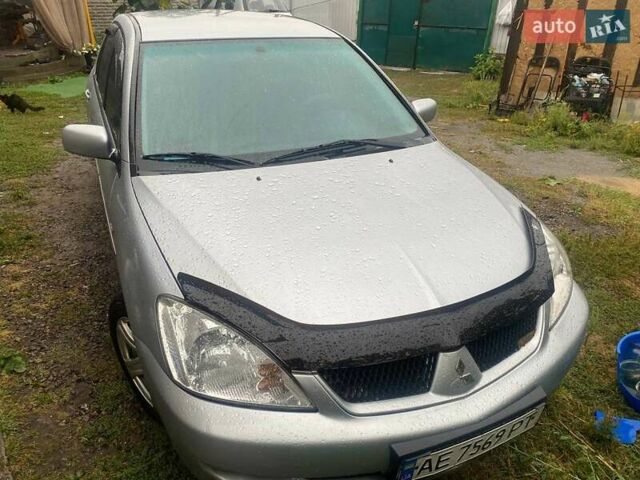 Сірий Міцубісі Lancer, об'ємом двигуна 1.58 л та пробігом 238 тис. км за 5000 $, фото 1 на Automoto.ua