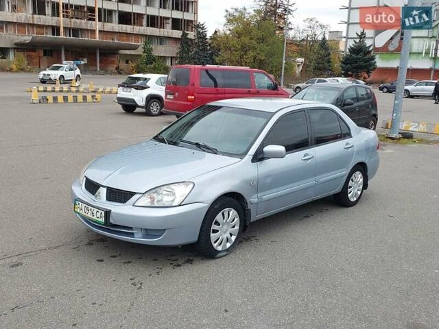 Мицубиси Лансер 2006 в Киеве на Automoto.ua Серый Мицубиси Лансер, объемом двигателя 1.6 л и пробегом 426 тыс. км за 3800 $, фото 1 на Automoto.ua