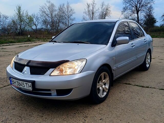 Сірий Міцубісі Lancer, об'ємом двигуна 1.6 л та пробігом 220 тис. км за 5300 $, фото 1 на Automoto.ua