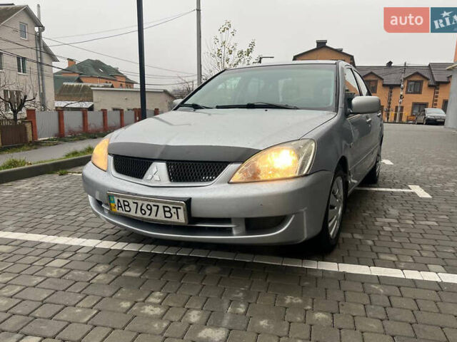 Сірий Міцубісі Lancer, об'ємом двигуна 1.58 л та пробігом 333 тис. км за 2999 $, фото 1 на Automoto.ua