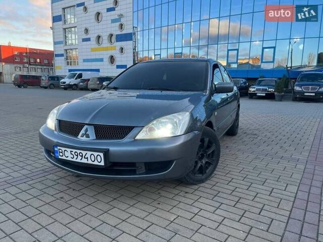 Серый Мицубиси Лансер, объемом двигателя 1.6 л и пробегом 279 тыс. км за 3990 $, фото 1 на Automoto.ua