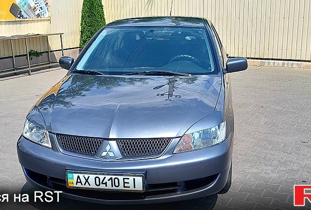 Сірий Міцубісі Lancer, об'ємом двигуна 1.6 л та пробігом 125 тис. км за 3850 $, фото 1 на Automoto.ua