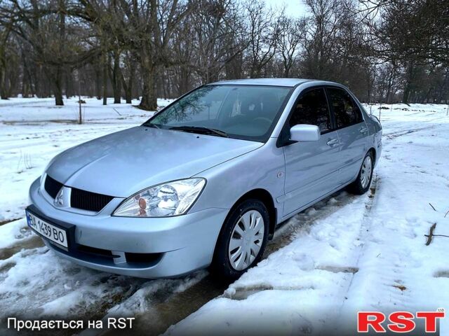 Сірий Міцубісі Lancer, об'ємом двигуна 1.6 л та пробігом 380 тис. км за 3199 $, фото 1 на Automoto.ua