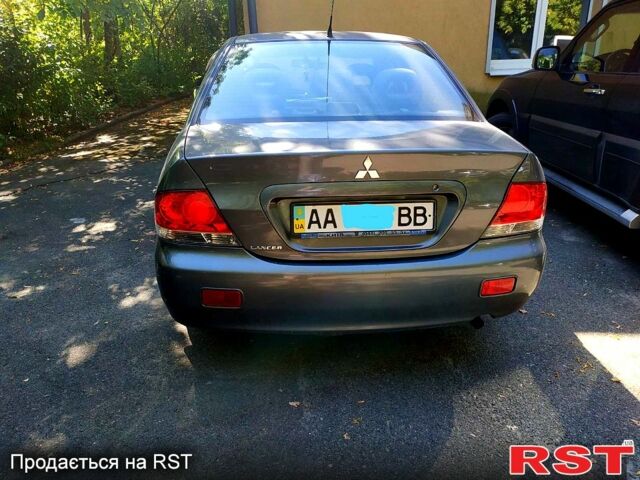 Сірий Міцубісі Lancer, об'ємом двигуна 1.6 л та пробігом 177 тис. км за 4000 $, фото 1 на Automoto.ua