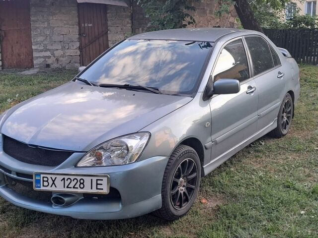 Сірий Міцубісі Lancer, об'ємом двигуна 1.6 л та пробігом 361 тис. км за 3000 $, фото 1 на Automoto.ua