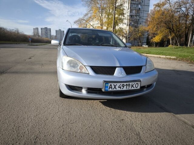 Сірий Міцубісі Lancer, об'ємом двигуна 1.6 л та пробігом 340 тис. км за 3000 $, фото 1 на Automoto.ua
