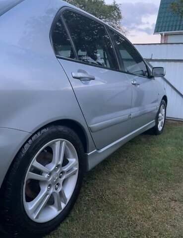 Серый Мицубиси Лансер, объемом двигателя 2 л и пробегом 141 тыс. км за 5200 $, фото 1 на Automoto.ua