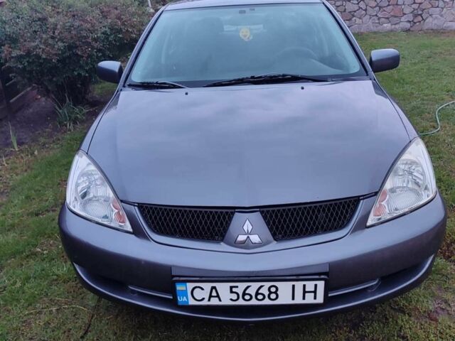 Сірий Міцубісі Lancer, об'ємом двигуна 1.6 л та пробігом 190 тис. км за 3500 $, фото 1 на Automoto.ua