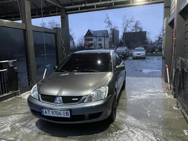 Серый Мицубиси Лансер, объемом двигателя 1.6 л и пробегом 213 тыс. км за 4450 $, фото 1 на Automoto.ua