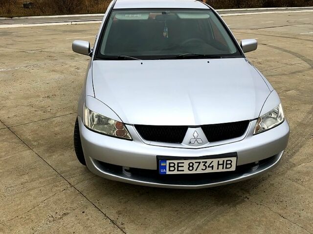 Серый Мицубиси Лансер, объемом двигателя 1.6 л и пробегом 0 тыс. км за 4000 $, фото 1 на Automoto.ua
