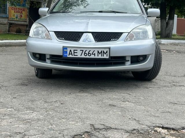 Сірий Міцубісі Lancer, об'ємом двигуна 1.6 л та пробігом 220 тис. км за 4800 $, фото 1 на Automoto.ua