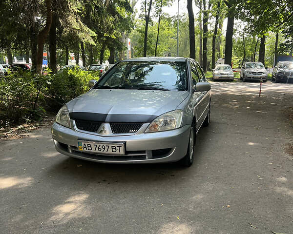 Сірий Міцубісі Lancer, об'ємом двигуна 1.6 л та пробігом 331 тис. км за 3100 $, фото 1 на Automoto.ua