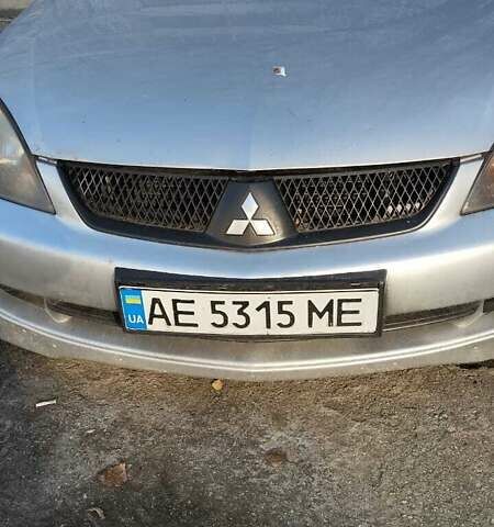Серый Мицубиси Лансер, объемом двигателя 2 л и пробегом 284 тыс. км за 4100 $, фото 1 на Automoto.ua