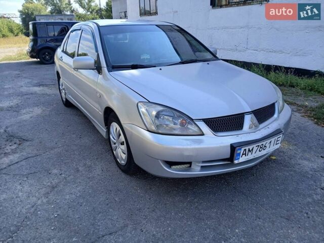 Сірий Міцубісі Lancer, об'ємом двигуна 1.6 л та пробігом 230 тис. км за 2550 $, фото 1 на Automoto.ua
