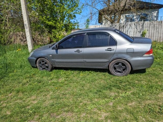 Сірий Міцубісі Lancer, об'ємом двигуна 0 л та пробігом 290 тис. км за 3800 $, фото 1 на Automoto.ua