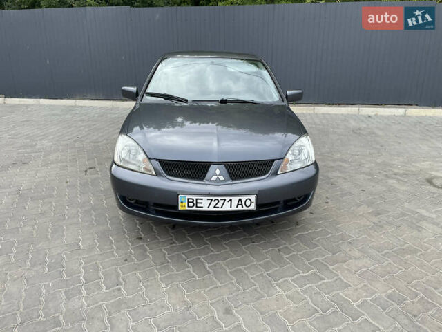 Сірий Міцубісі Lancer, об'ємом двигуна 1.58 л та пробігом 162 тис. км за 4650 $, фото 1 на Automoto.ua