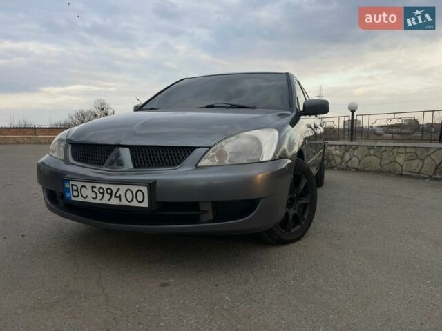 Сірий Міцубісі Lancer, об'ємом двигуна 1.58 л та пробігом 290 тис. км за 3400 $, фото 1 на Automoto.ua