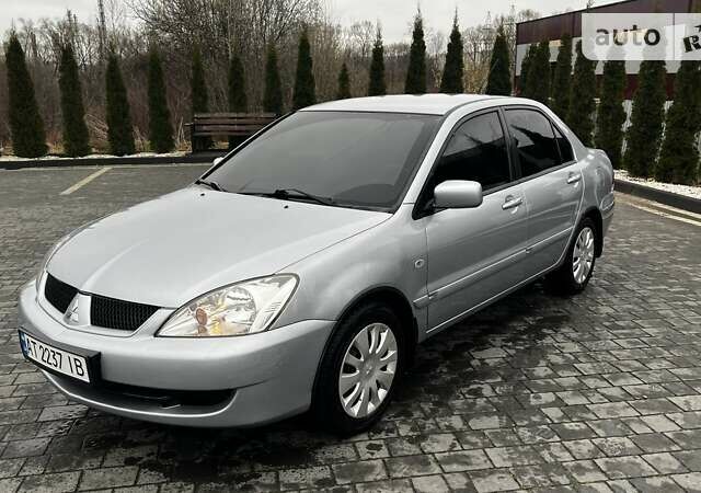 Сірий Міцубісі Lancer, об'ємом двигуна 1.6 л та пробігом 170 тис. км за 4200 $, фото 1 на Automoto.ua