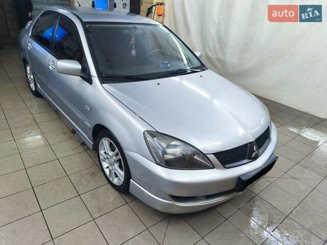 Серый Мицубиси Лансер, объемом двигателя 2 л и пробегом 284 тыс. км за 4100 $, фото 1 на Automoto.ua