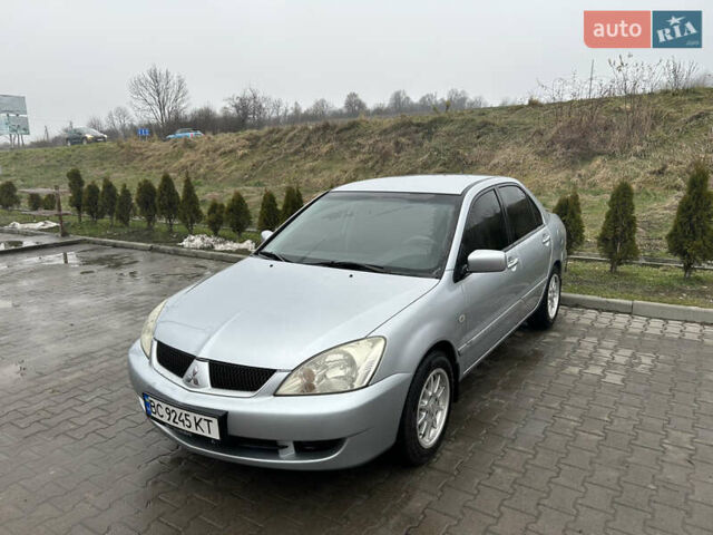 Сірий Міцубісі Lancer, об'ємом двигуна 1.6 л та пробігом 223 тис. км за 3900 $, фото 1 на Automoto.ua