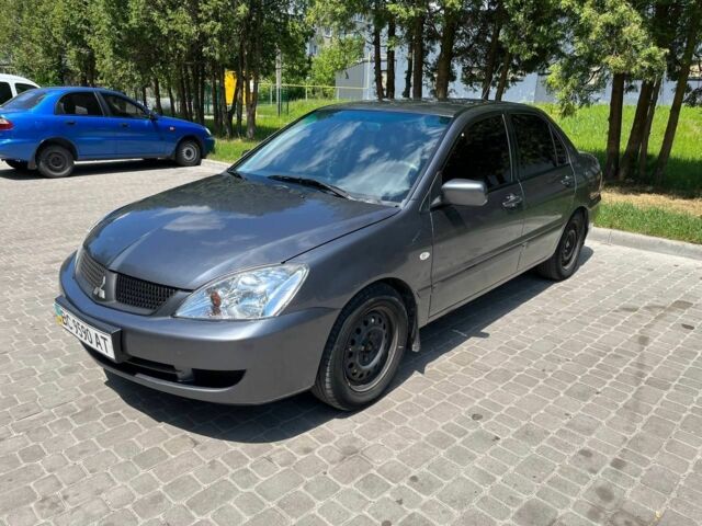 Сірий Міцубісі Lancer, об'ємом двигуна 1.6 л та пробігом 200 тис. км за 3700 $, фото 1 на Automoto.ua