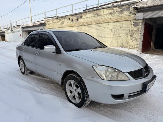 Сірий Міцубісі Lancer, об'ємом двигуна 1.6 л та пробігом 220 тис. км за 2950 $, фото 1 на Automoto.ua