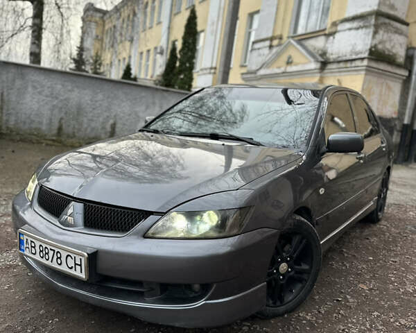 Сірий Міцубісі Lancer, об'ємом двигуна 2 л та пробігом 200 тис. км за 4999 $, фото 1 на Automoto.ua