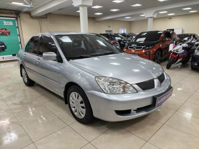 Сірий Міцубісі Lancer, об'ємом двигуна 1.6 л та пробігом 173 тис. км за 4298 $, фото 1 на Automoto.ua
