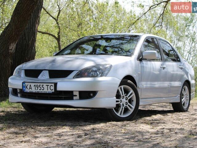 Серый Мицубиси Лансер, объемом двигателя 2 л и пробегом 141 тыс. км за 6000 $, фото 1 на Automoto.ua