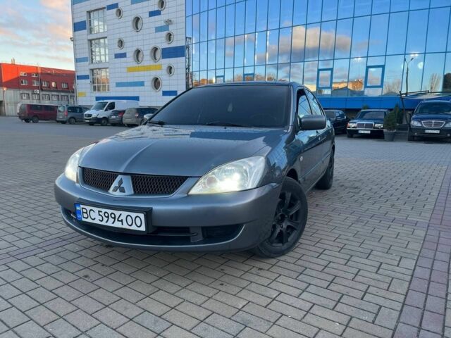 Серый Мицубиси Лансер, объемом двигателя 1.6 л и пробегом 279 тыс. км за 3990 $, фото 1 на Automoto.ua