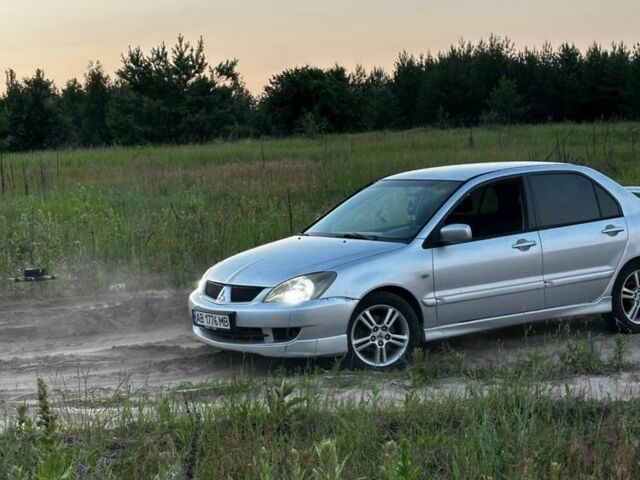 Сірий Міцубісі Lancer, об'ємом двигуна 2 л та пробігом 300 тис. км за 4100 $, фото 1 на Automoto.ua