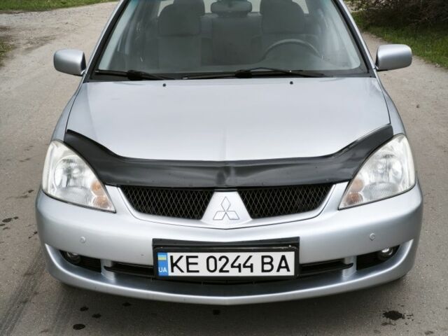 Серый Мицубиси Лансер, объемом двигателя 1.6 л и пробегом 218 тыс. км за 4500 $, фото 1 на Automoto.ua
