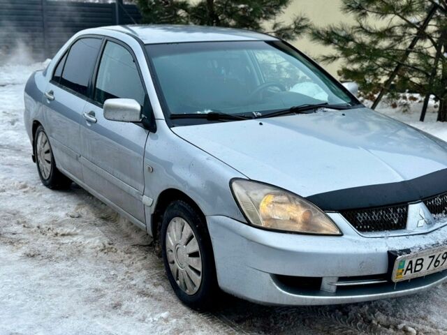 Сірий Міцубісі Lancer, об'ємом двигуна 1.6 л та пробігом 300 тис. км за 3200 $, фото 1 на Automoto.ua