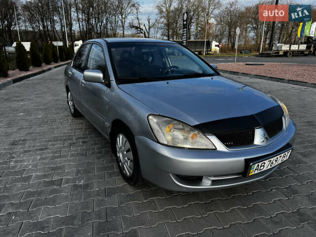 Сірий Міцубісі Lancer, об'ємом двигуна 1.58 л та пробігом 333 тис. км за 2500 $, фото 1 на Automoto.ua