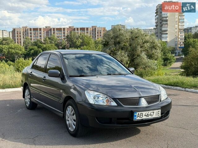Сірий Міцубісі Lancer, об'ємом двигуна 1.6 л та пробігом 229 тис. км за 3000 $, фото 1 на Automoto.ua