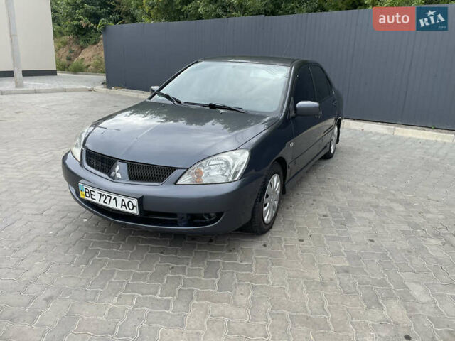 Сірий Міцубісі Lancer, об'ємом двигуна 1.58 л та пробігом 162 тис. км за 4650 $, фото 1 на Automoto.ua