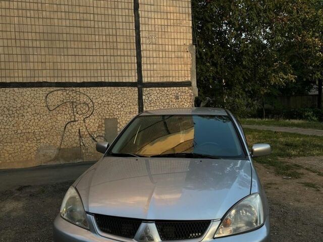 Сірий Міцубісі Lancer, об'ємом двигуна 1.6 л та пробігом 225 тис. км за 4700 $, фото 1 на Automoto.ua