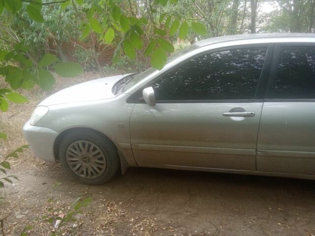 Сірий Міцубісі Lancer, об'ємом двигуна 1.6 л та пробігом 3 тис. км за 3200 $, фото 1 на Automoto.ua