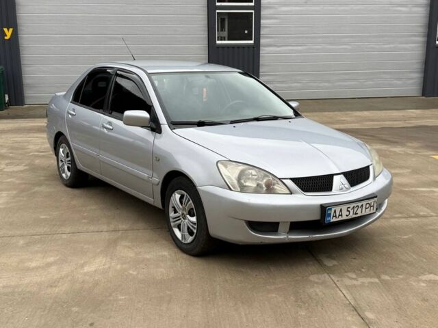 Сірий Міцубісі Lancer, об'ємом двигуна 1.6 л та пробігом 220 тис. км за 2450 $, фото 1 на Automoto.ua