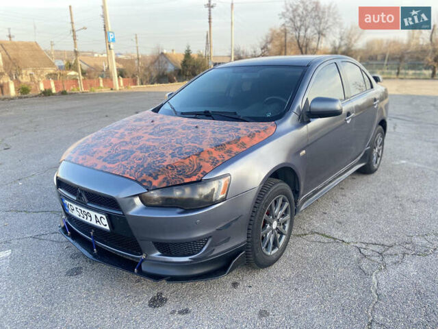 Серый Мицубиси Лансер, объемом двигателя 1.5 л и пробегом 224 тыс. км за 6300 $, фото 1 на Automoto.ua