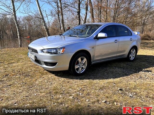 Серый Мицубиси Лансер, объемом двигателя 1.5 л и пробегом 263 тыс. км за 5950 $, фото 1 на Automoto.ua