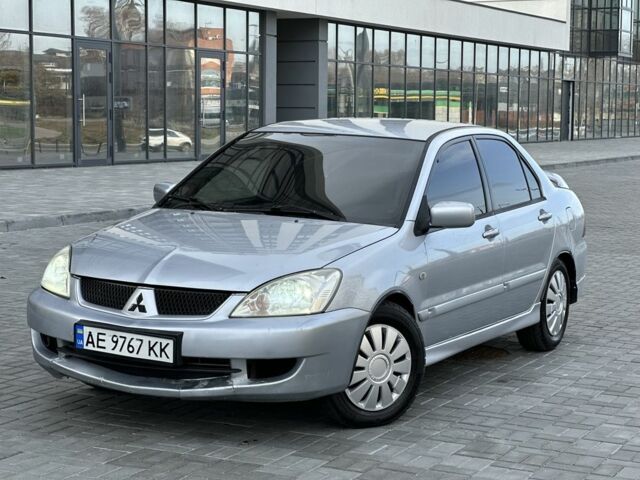Сірий Міцубісі Lancer, об'ємом двигуна 1.6 л та пробігом 200 тис. км за 3900 $, фото 1 на Automoto.ua