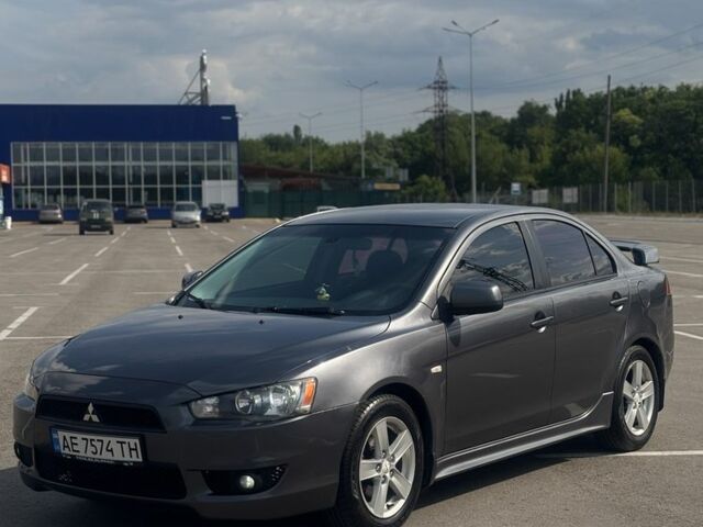 Сірий Міцубісі Lancer, об'ємом двигуна 2 л та пробігом 220 тис. км за 6600 $, фото 1 на Automoto.ua
