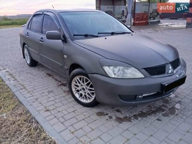 Мицубиси Лансер 2007 в Ивано-Франковске на Automoto.ua Серый Мицубиси Лансер, объемом двигателя 1.58 л и пробегом 238 тыс. км за 2950 $, фото 1 на Automoto.ua