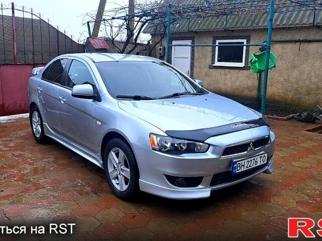 Сірий Міцубісі Lancer, об'ємом двигуна 2 л та пробігом 23000 тис. км за 5999 $, фото 1 на Automoto.ua