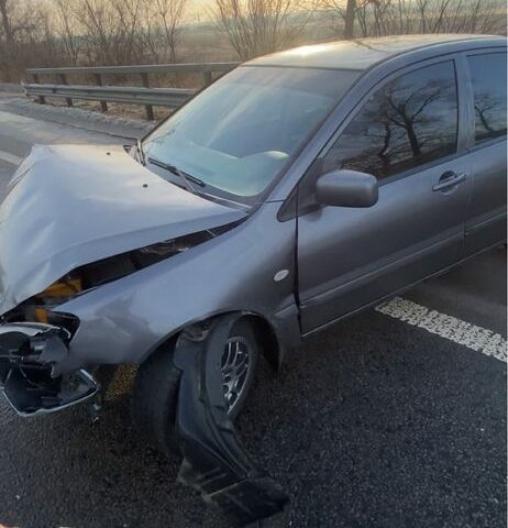 Серый Мицубиси Лансер, объемом двигателя 1.6 л и пробегом 191 тыс. км за 2000 $, фото 1 на Automoto.ua