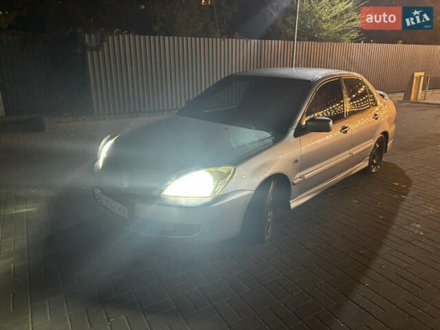 Сірий Міцубісі Lancer, об'ємом двигуна 1.6 л та пробігом 199 тис. км за 4000 $, фото 1 на Automoto.ua