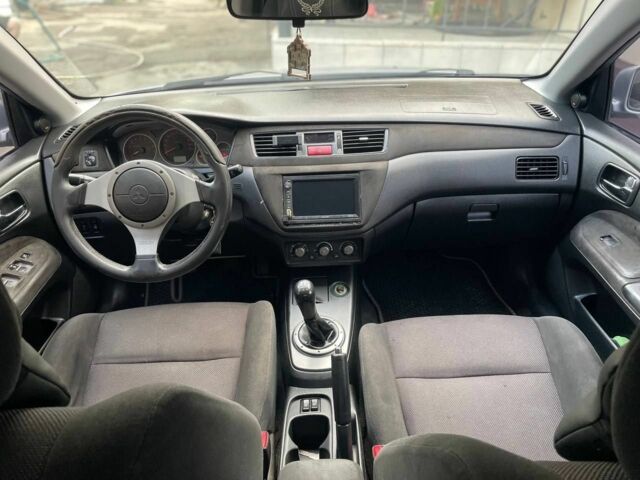 Сірий Міцубісі Lancer, об'ємом двигуна 2 л та пробігом 220 тис. км за 4500 $, фото 1 на Automoto.ua
