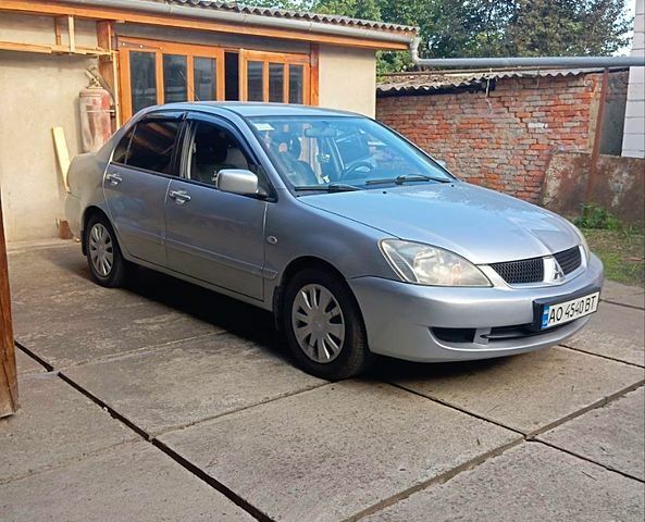 Сірий Міцубісі Lancer, об'ємом двигуна 1.6 л та пробігом 0 тис. км за 3700 $, фото 1 на Automoto.ua